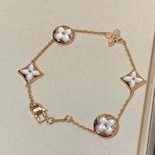 [Glow Muse]BRACELET 5 MOTIFS ÉTOILE ET SOLEIL EN NACRE ET OR ROSE