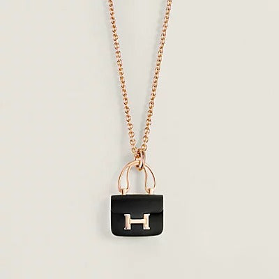{
  "Glow Muse": "Glow Muse",
  "WOMEN'S HM AMULETTES CONSTANCE PENDANT NECKLACE": "COLLIER PENDENTIF HM AMULETTES CONSTANCE POUR FEMME"
}