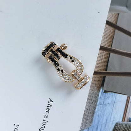 {
  "Glow Muse": "Glow Muse",
  "FORCE LARGE HORSESHOE BLACK WHITE DIAMOND BRACELET ROSE GOLD": "BRACELET FORCE GRAND MODÈLE FER À CHEVAL DIAMANTS NOIRS ET BLANCS OR ROSE"
}