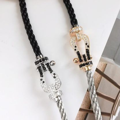 {
  "Glow Muse": "Glow Muse",
  "FORCE LARGE HORSESHOE BLACK WHITE DIAMOND BRACELET ROSE GOLD": "BRACELET FORCE GRAND MODÈLE FER À CHEVAL DIAMANTS NOIRS ET BLANCS OR ROSE"
}