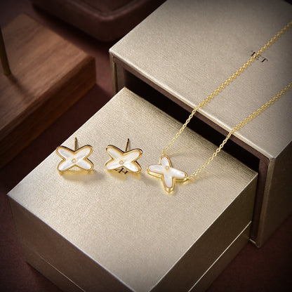 [Glow Muse]BOUCLES D'OREILLES EN OR ET NACRE BLANCHE JEUX DE LIENS